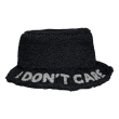 Cappello bucket in tessuto effetto bouclé. Decoro I DON'T CARE.